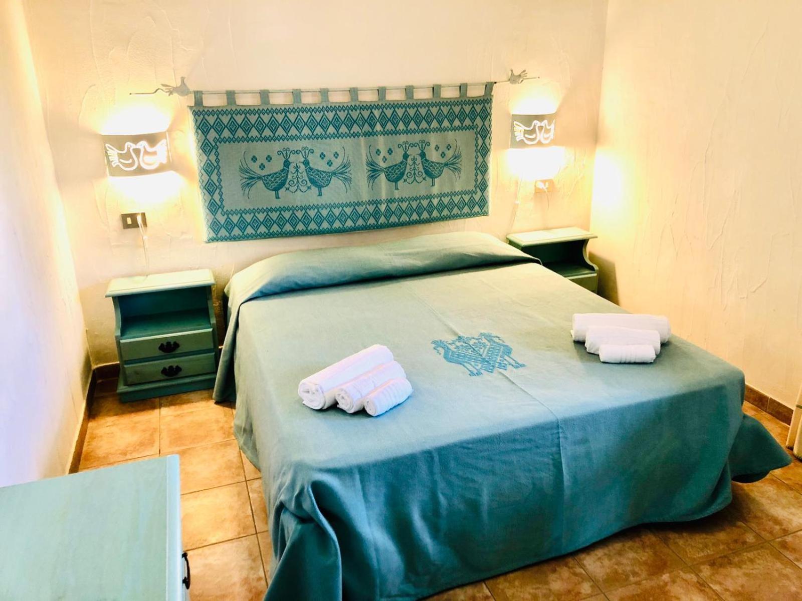 Le Corti Di Marinella Aparthotel มาริเนลลา ห้อง รูปภาพ